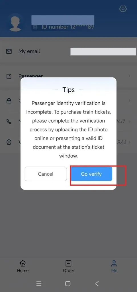 12306 Tips popup saying passenger identity verification is incomplete, with Go verify button highlighted