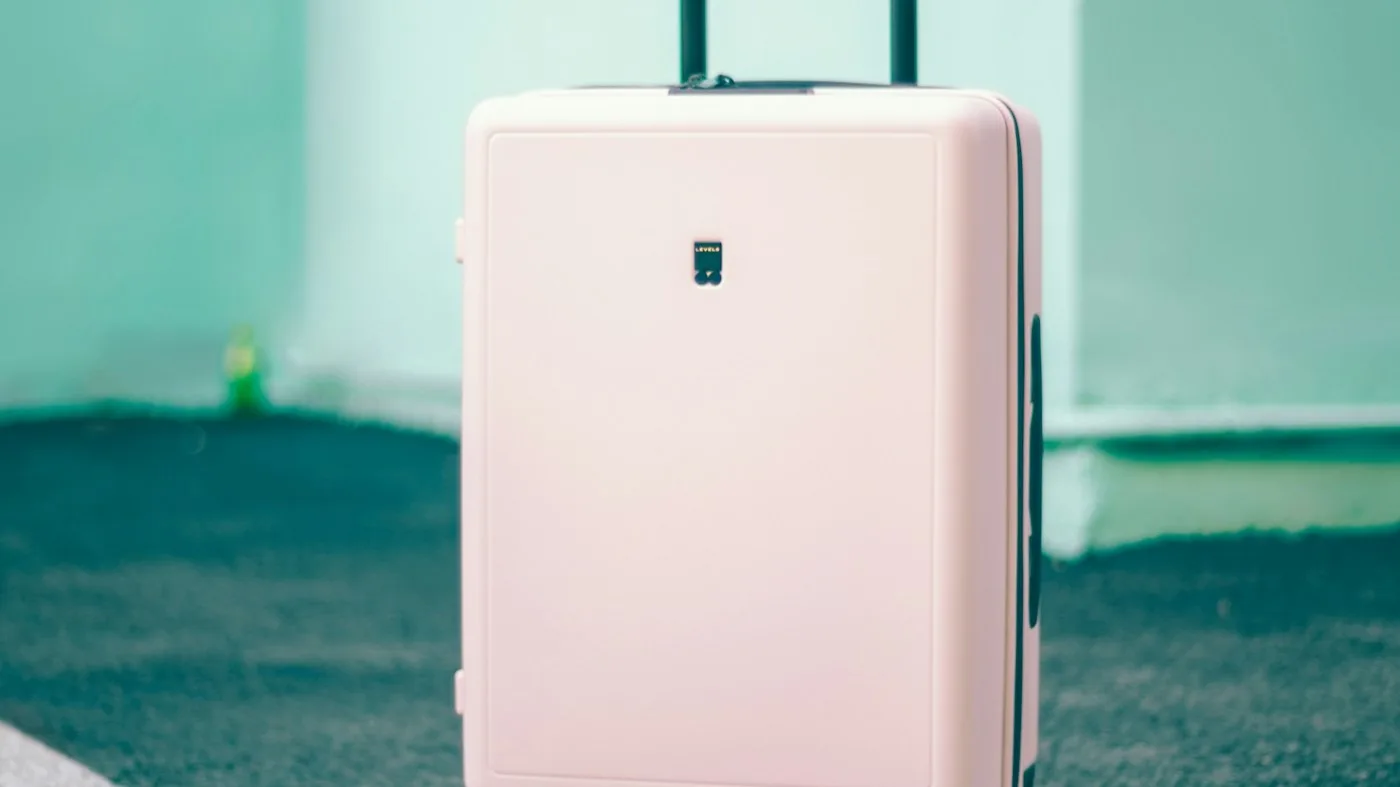 Luggage ready for a China trip when cash and cards both matter