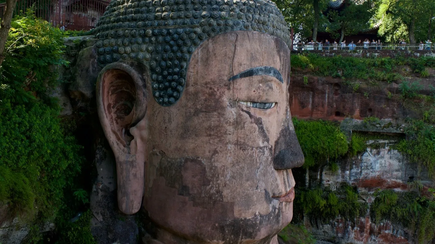 Leshan Giant Buddha carved into a cliff face above the Min River in Sichuan