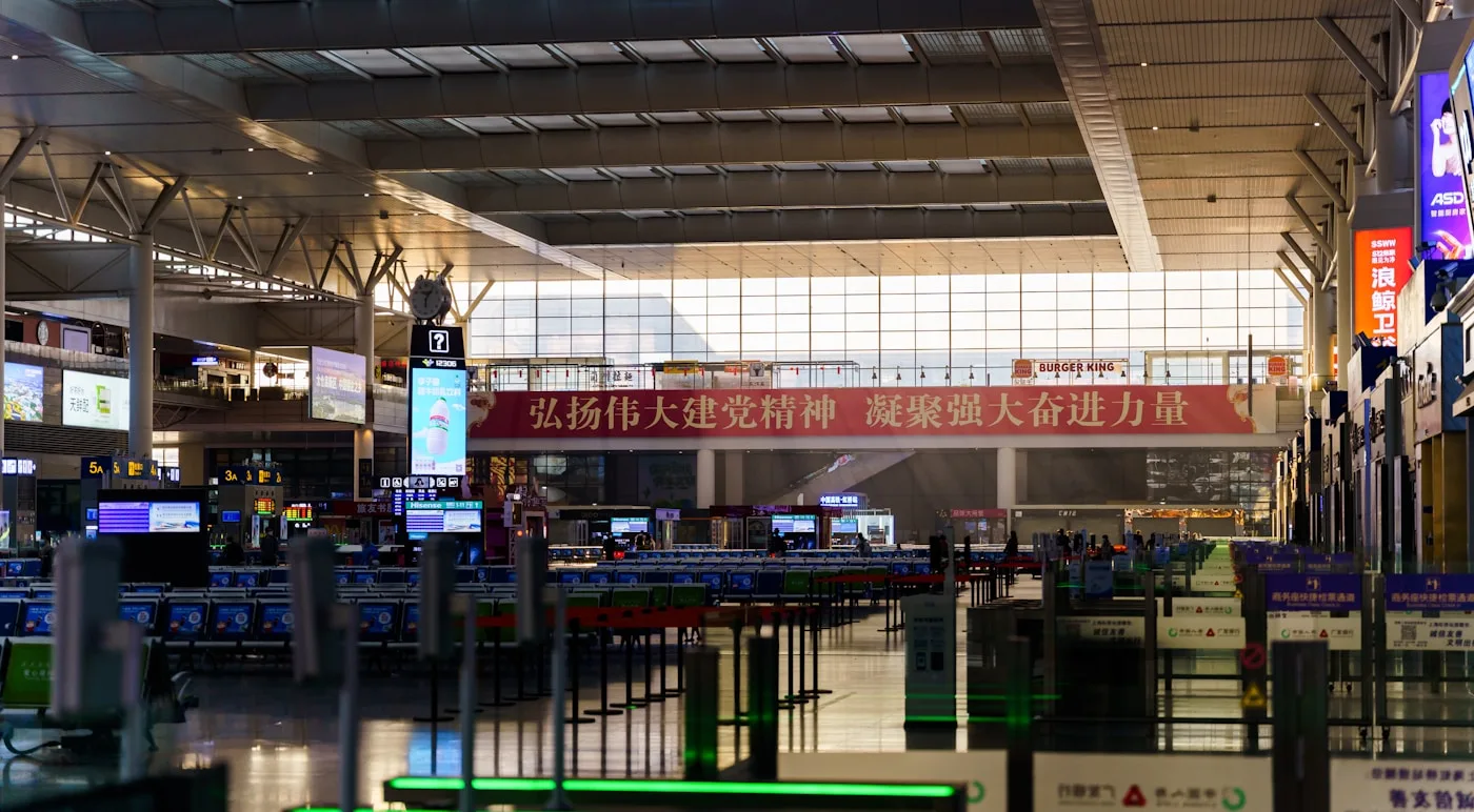 Sunlit Shanghai railway terminal hall for airport-to-city transfers
