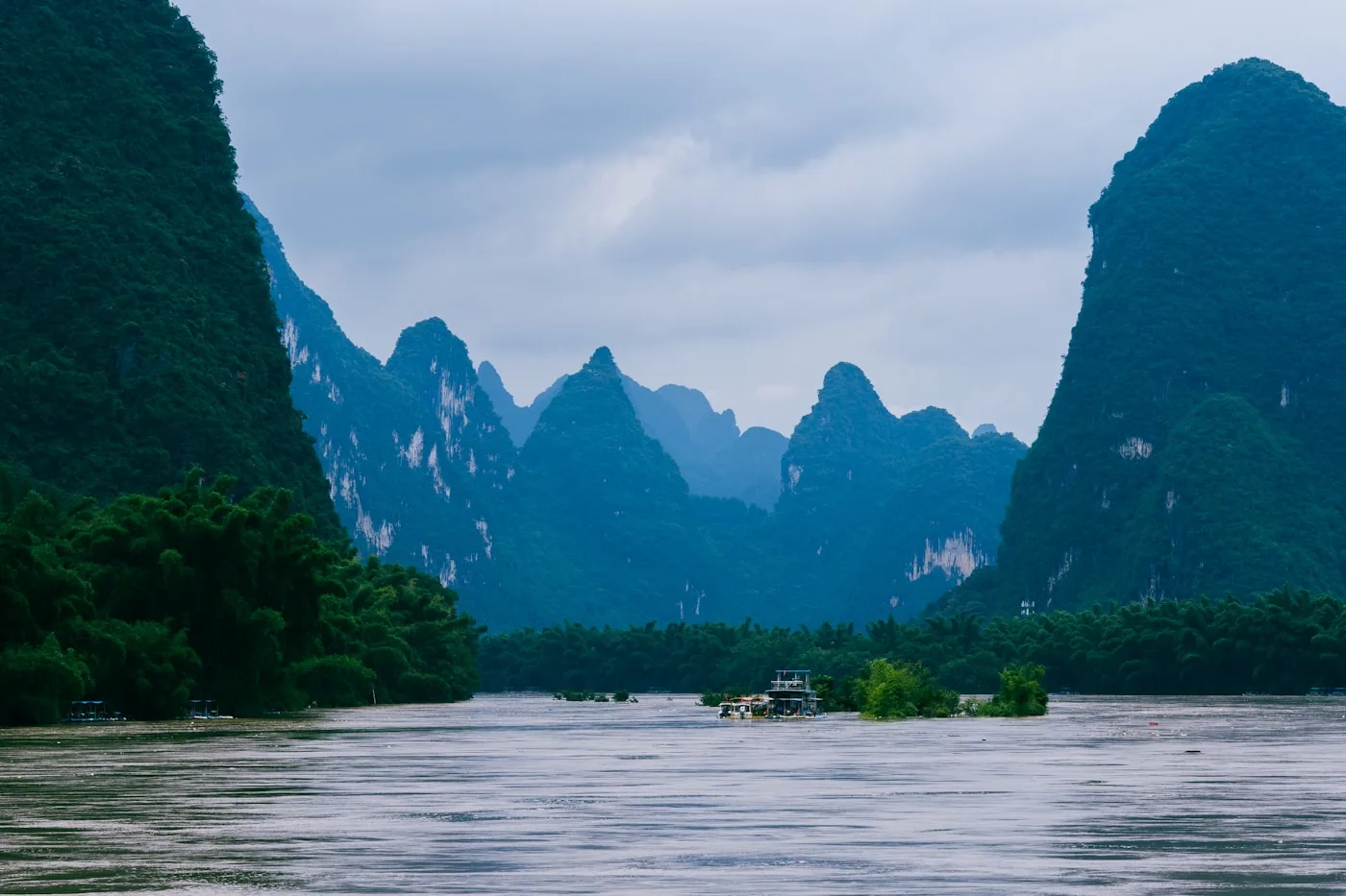 Yangshuo karst countryside with bicycles along the Yulong River
